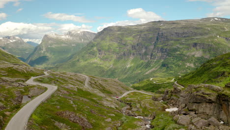 panorama of winding road by the mountain from eidsdal to geiranger in norway