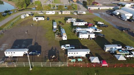 drone view of horse trailers and campers in a small town