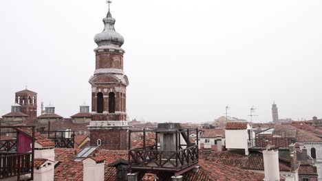 venice italy rooftop terraces and bell towers on foggy grey sky day