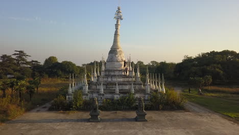 Tourists-explore-leaning-Burmese-stupa-replica-in-Shanghai-China-park