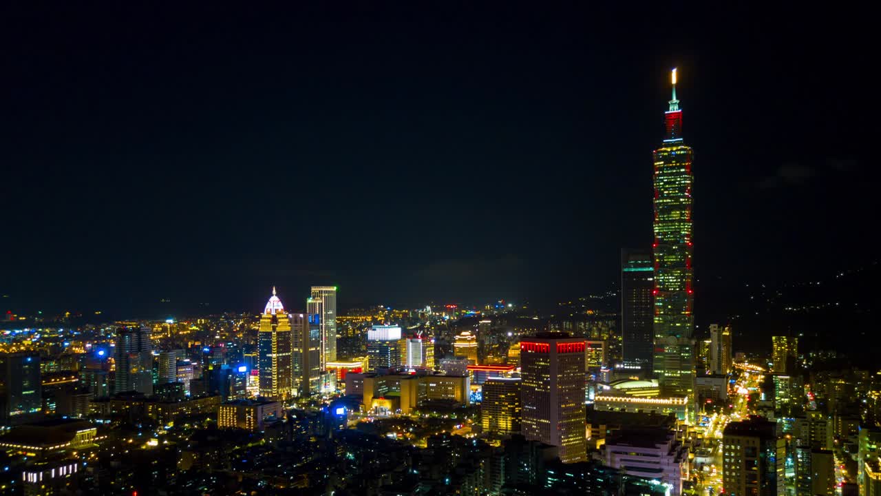 la noche iluminada paisaje de la ciudad de taipei famosa torre panorama aéreo 4k timelapse taiwán