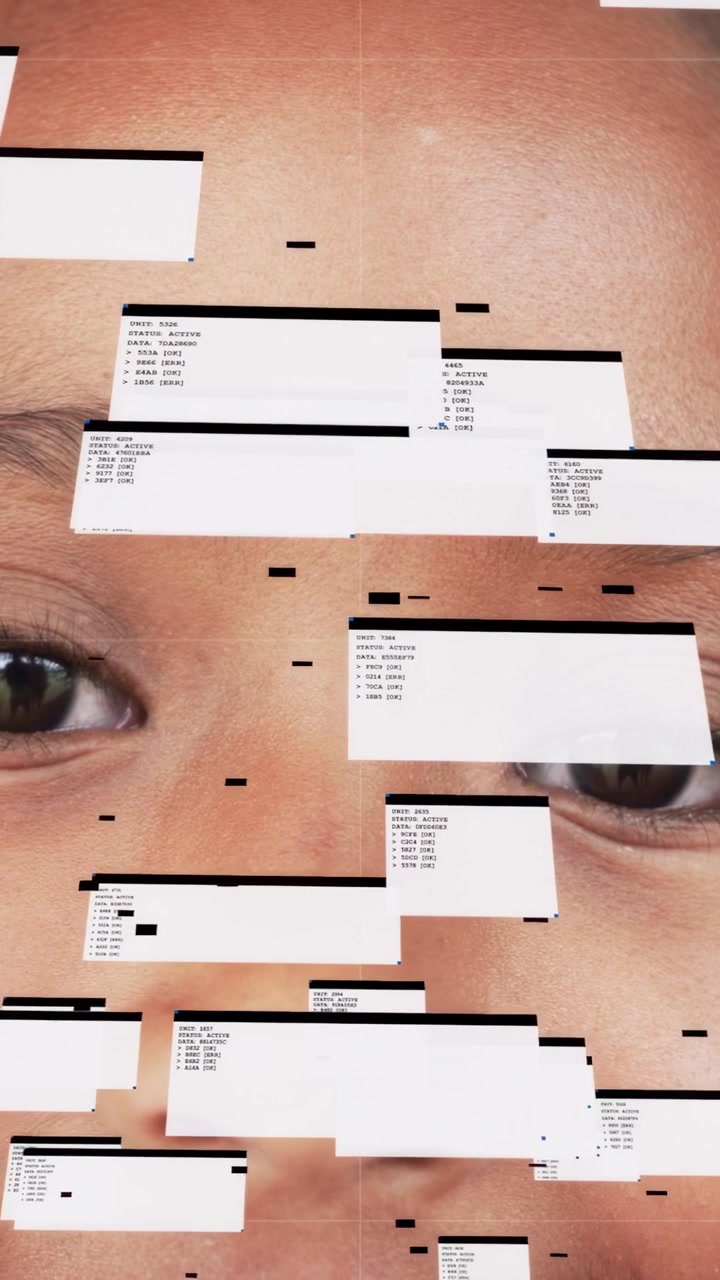 Vertical video: Female child blinking, dialog boxes appearing and drifting across face, showing UI