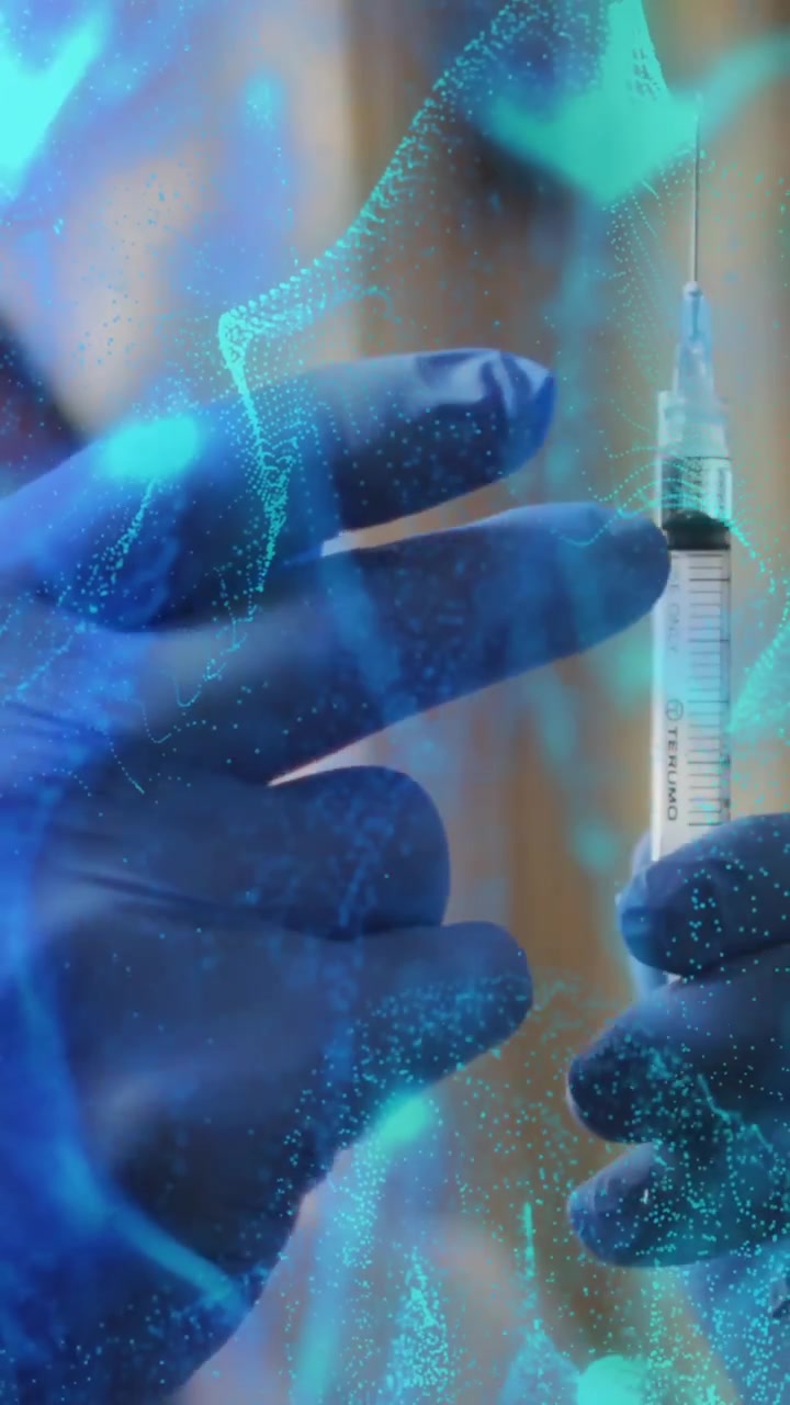 Holding syringe, medical professional with gloves over blue virus cells animation