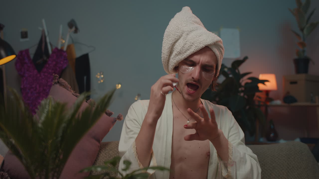 Man applying nail polish at home