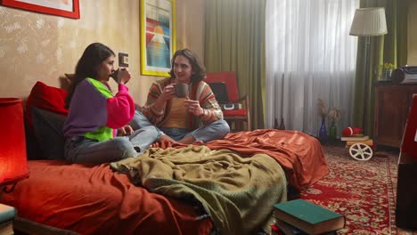 couple relaxing and talking in a cozy retro bedroom