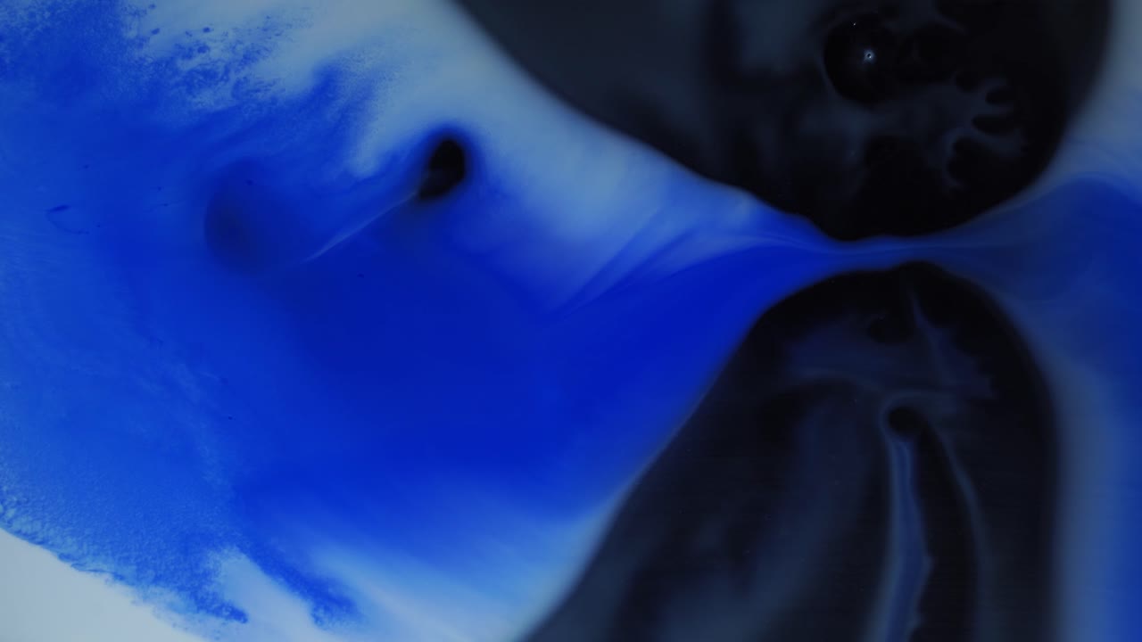 An abstract oceanic illusion unfolds as swirling pigments mimic a parting sea