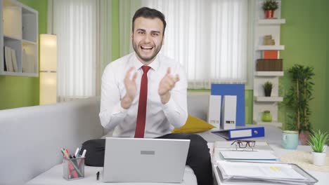 Young-businessman-rejoicing-and-congratulating-good-news,-mail.