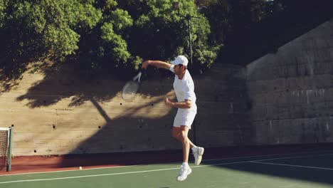 man playing tennis on a sunny day