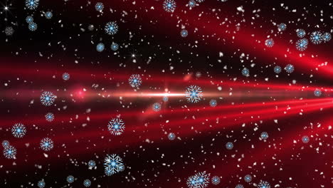 nieve cayendo sobre las luces de navidad en fondo negro y rojo