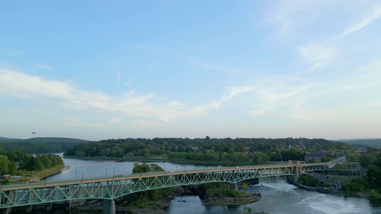 Turners Falls-Gill Bridge Over Connecticut River In Turners Falls, Massachusetts, United States of America. - wide shot