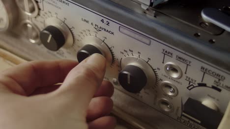 adjusting the volume on a nagra professional recording device