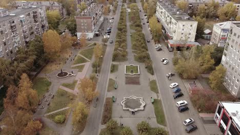 aerial dolly in downtown industrial city of bratsk in russia in autumn