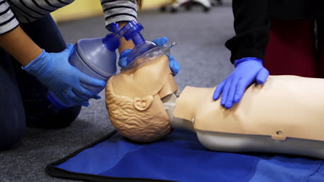 medical male dummy on blue hospital blanket. medical equipments for education. training video for medics.