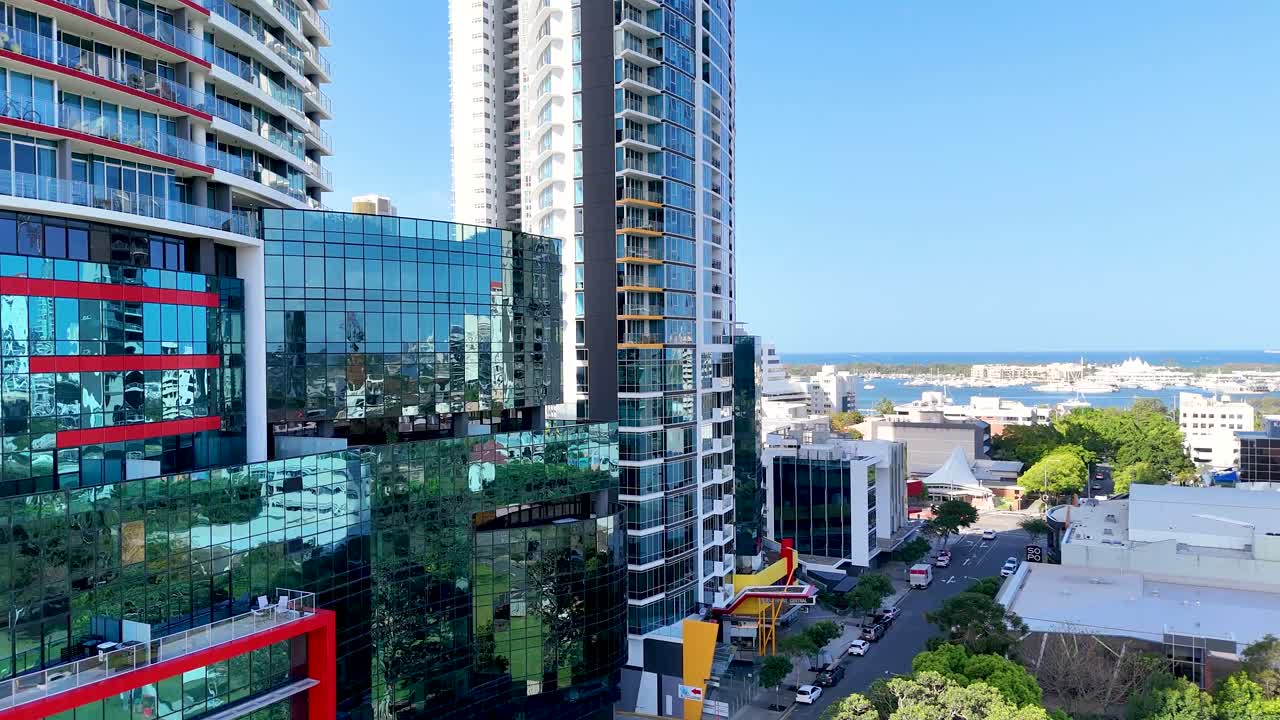 Stunning Aerial View of a Coastal City with Highrise Buildings and Ocean