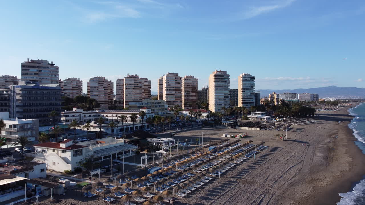 Lounge Beds on Beach - Aerial Reveal Torremolinos Costa Del Sol Spain