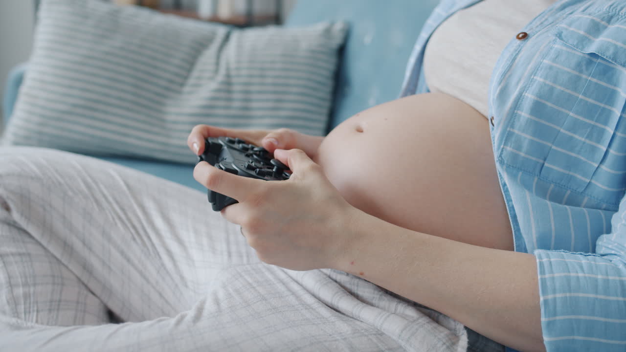Pregnant Woman Playing Video Games