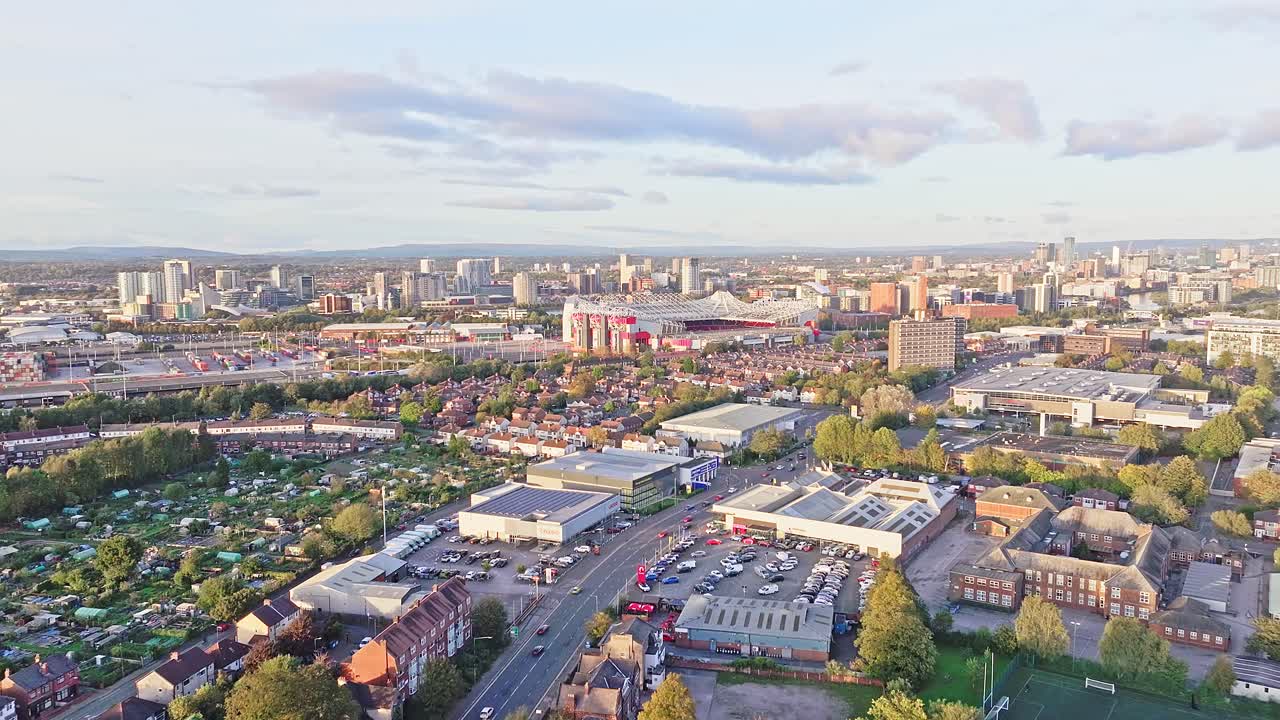 Aerial forward shot of Manchester United's Old Trafford football stadium, England