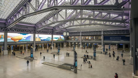 new york ny usa-january 8th, 2021 visitors to the daniel patrick moynihan train hall at pennsylvania station in new york enjoy the new space from the top level