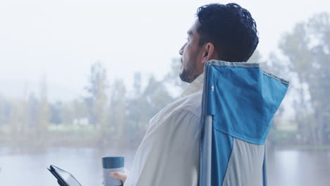 Relax-man,-camping-and-tablet-in-nature