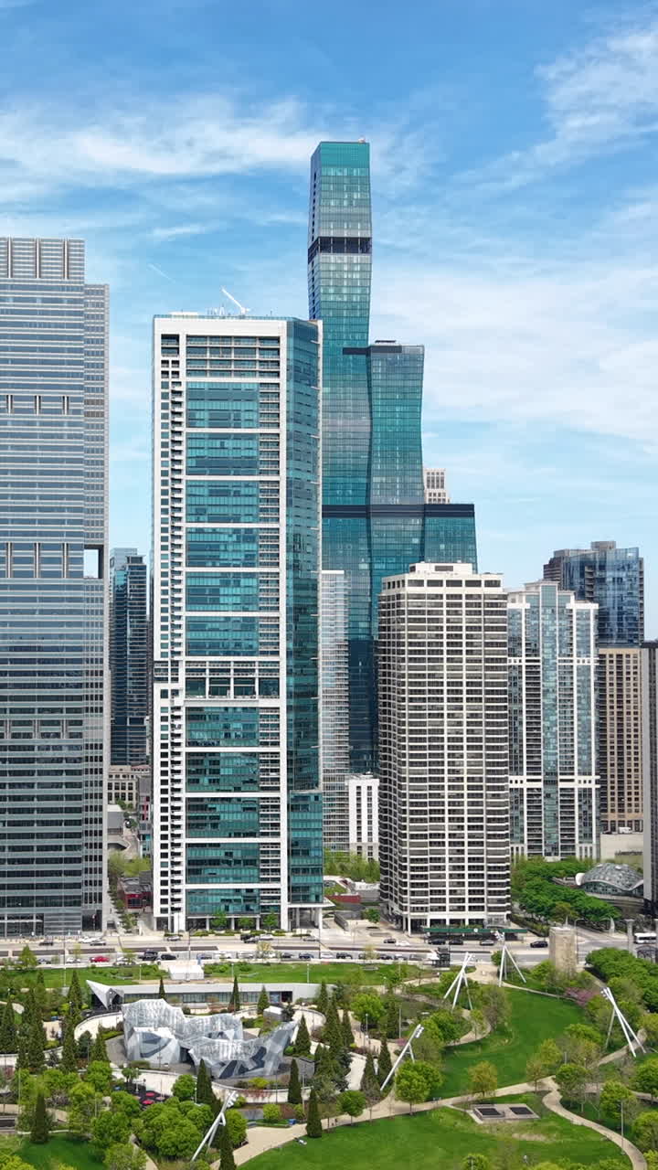 Vertical Drone Shot of Chicago USA Downtown Skyscrapers and Towers by Millennium Park