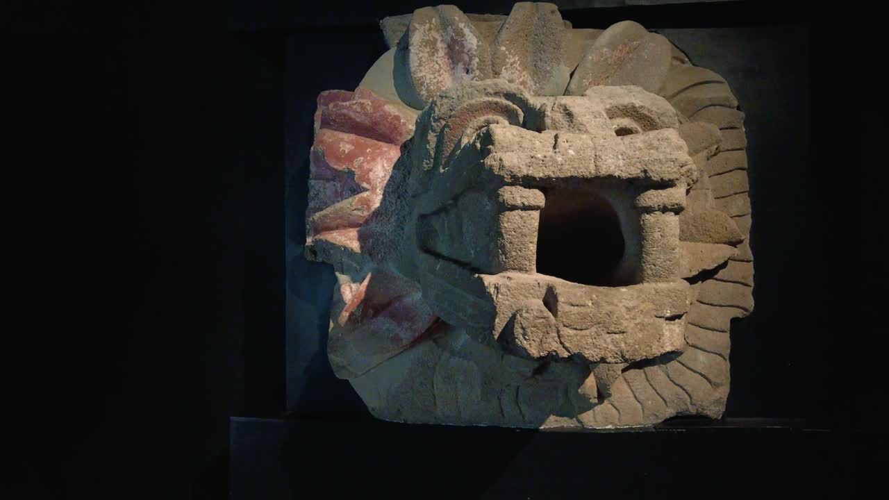 Sculpture of Quetzalcoatl, the feathered snake, god of the Aztec civilization, Teotihuacan, Mexico.