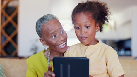 grandmother, child and smile with tablet in home