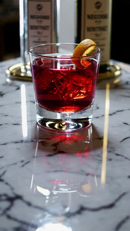 negroni cocktail on marble table