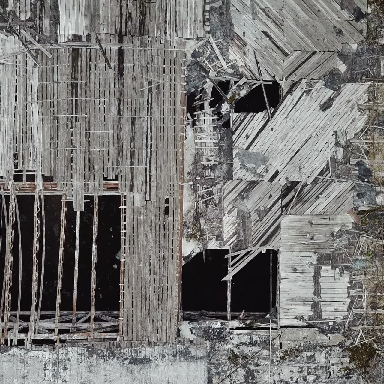 Ruined roof of an old abandoned factory. Aerial view