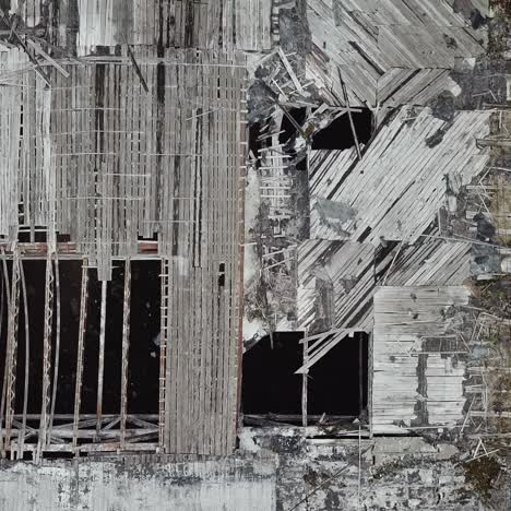 ruined roof of an old abandoned factory. aerial view