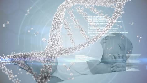 잠자는 아기 위에서 3차원 dna 가닥이 회전하고 데이터 처리되는 애니메이션