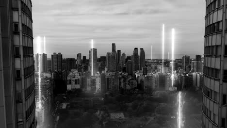 Future-concept-with-digital-lines-connecting-city---Cinematic-drone-flight-between-twin-skyscraper-buildings-in-Buenos-Aires---Modern-skyline-with-high-tech-data-communication---Black-and-white-colors