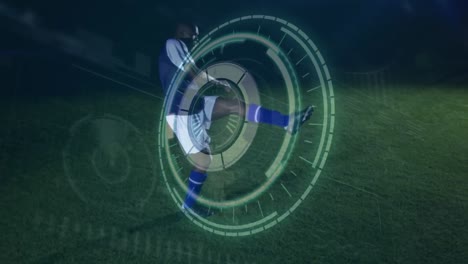 Animation-of-round-scanner-over-african-american-male-soccer-player-kicking-the-ball