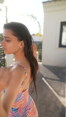 woman in a colorful swimsuit outdoors