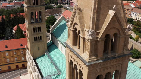 Neo-Romanesque-Exterior-Of-Pécs-Cathedral-In-The-City-Of-Pécs,-Hungary---aerial-drone-shot