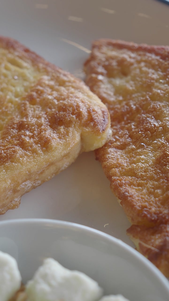 Close-up of Golden Brown French Toast on a Plate