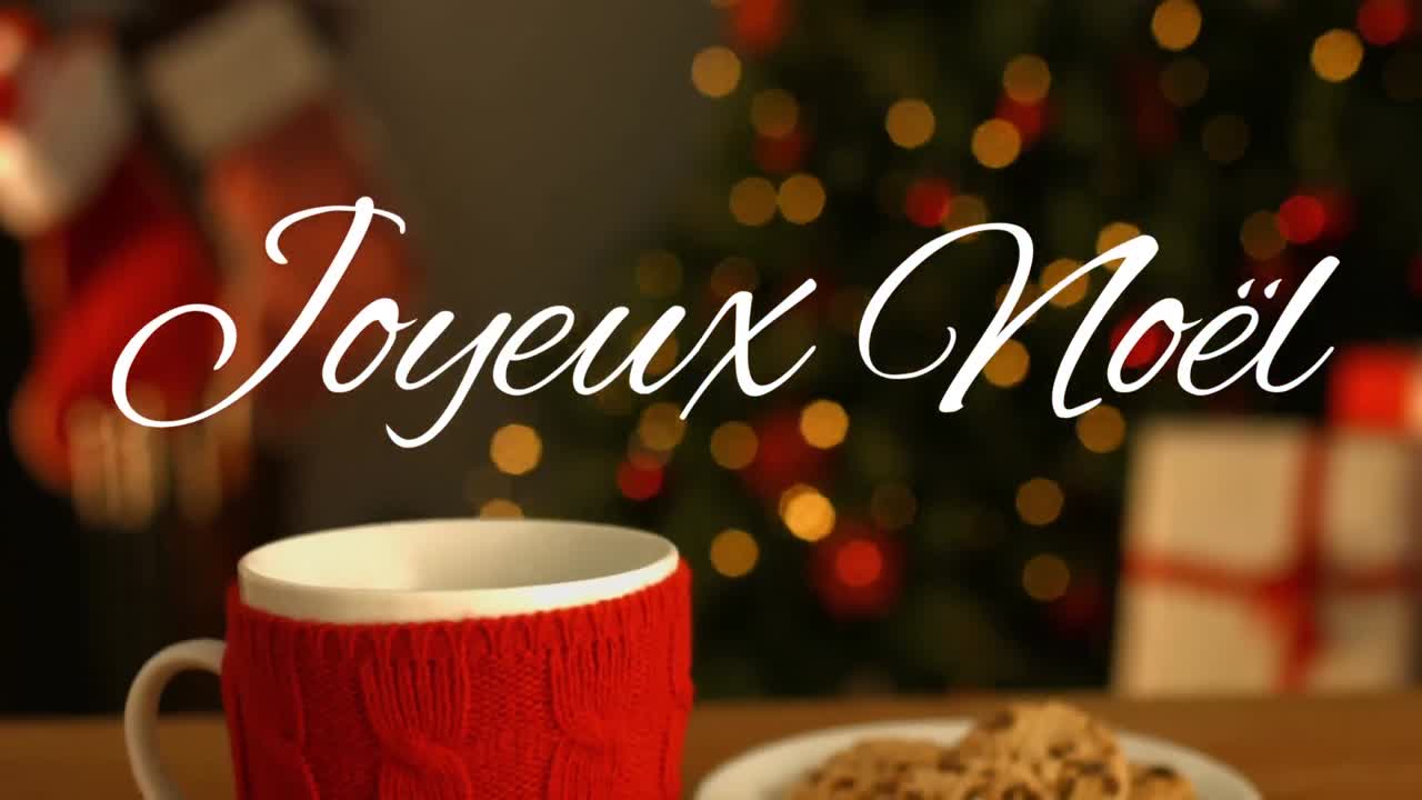Joyeux No&Atilde;&laquo;l written over mug and plate with cookies