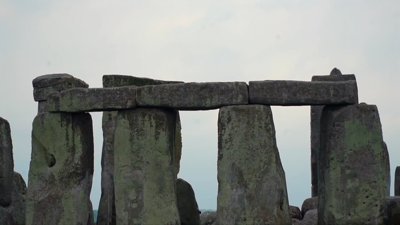 Massive standing stones of Stonehenge aligned under evening light, showcasing England’s iconic prehistoric monument near Salisbury on the Wiltshire plains.