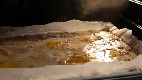 lasagne baking in oven