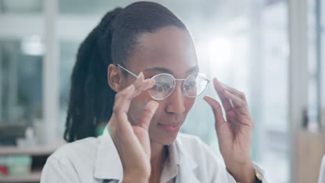 Reading,-glasses-and-African-woman-in-office