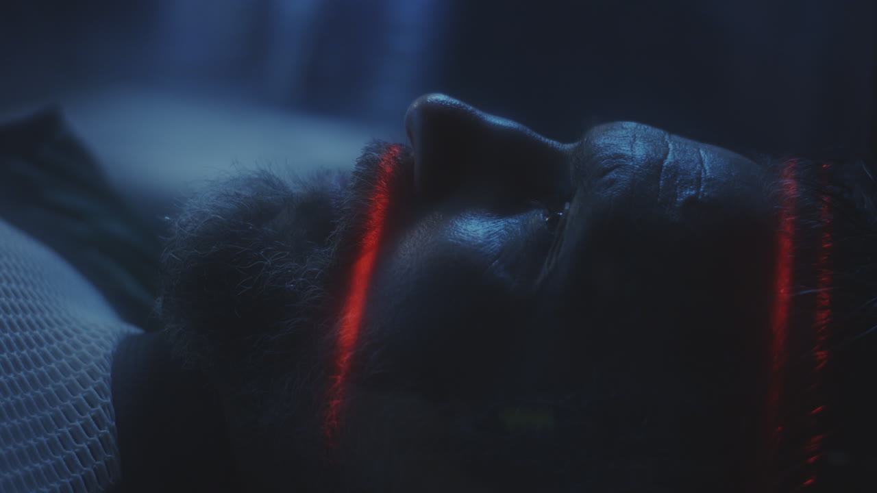 Man Undergoing Futuristic Medical Scan