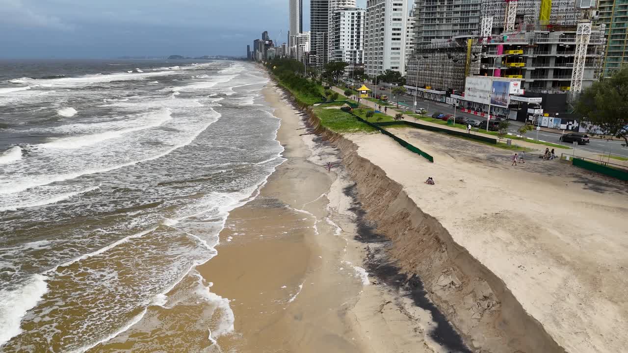 Drone footage captures severe coastal erosion along Gold Coast, Australia, highlighting environmental impact on beachfront properties and infrastructure