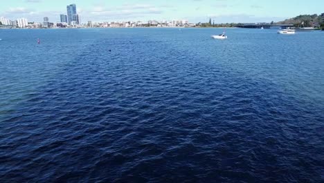 Drone-ascending-over-Swan-River---Narrows-Bridge-and-South-Perth-in-background