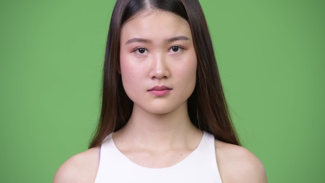 Young beautiful Asian businesswoman