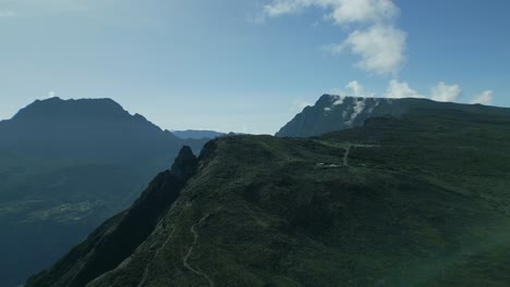 Approaching-Crater-de-Cirque-du-Mafate-with-drone-from-Maido-on-french-La-Reunion-Island-in-the-morning-hours