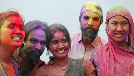 multi ethnic people celebrating the festival of colors holi in india