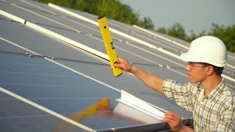 solar panel technician working with solar panels