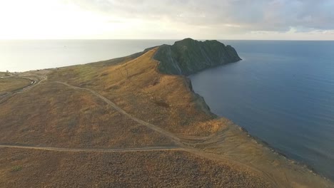 aerial view of a cape and coastline