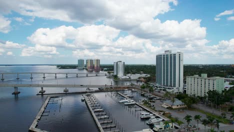 drone aerial shot of high-rise condos and the cape coral bridge in florida