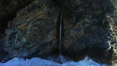 drone shot of mcway falls waterfall on scenic coastline at big sur state park off pacific coast highway in california 2