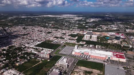 Flying-over-the-huge-malls-in-merida,-yucatan,-mexico